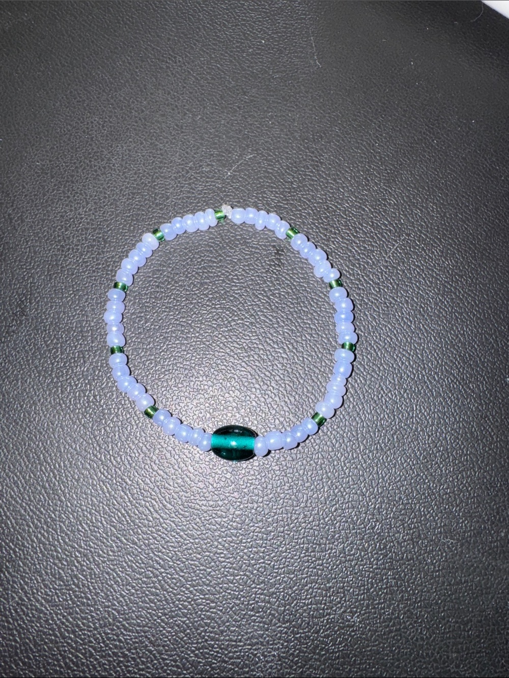 Pastel Blue Beaded Bracelet with Emerald Accent